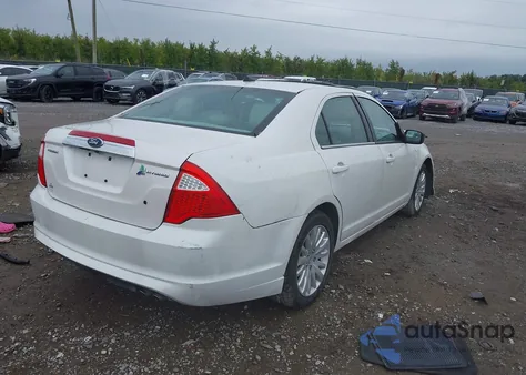 2011 Ford Fusion Hybrid from USA, damaged, VIN 3FADP0L31BR119560